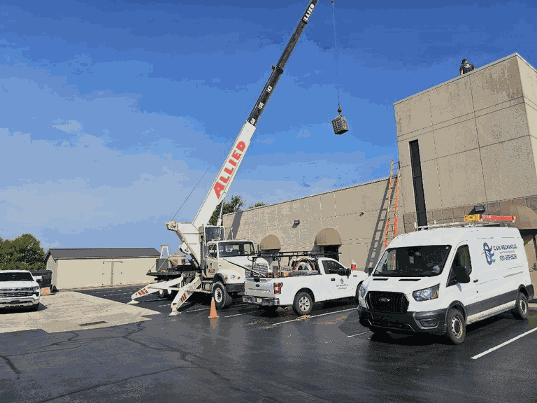 C&W Mechanical team performing rooftop HVAC work